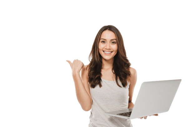 Smiling woman holding a laptop and pointing